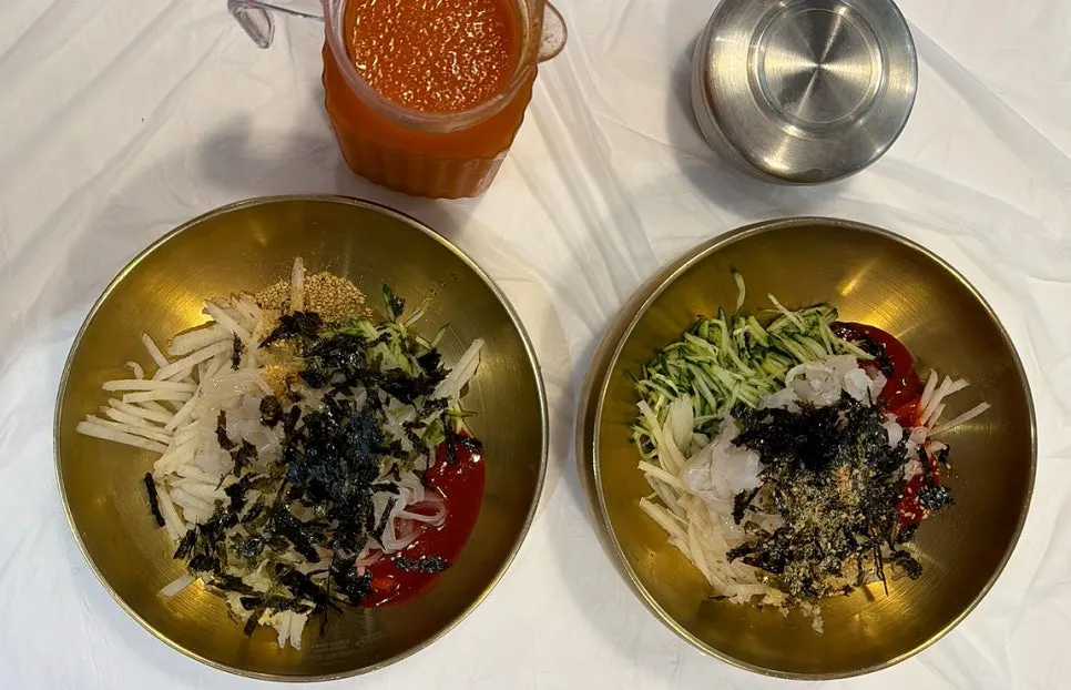 A plate of shrimp fried rice eaten by the kid