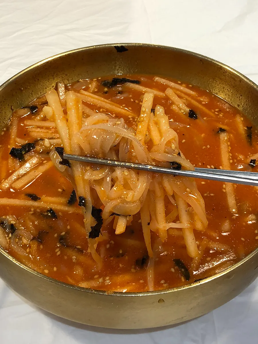 Close-up of springy squid piled in the mulhoe