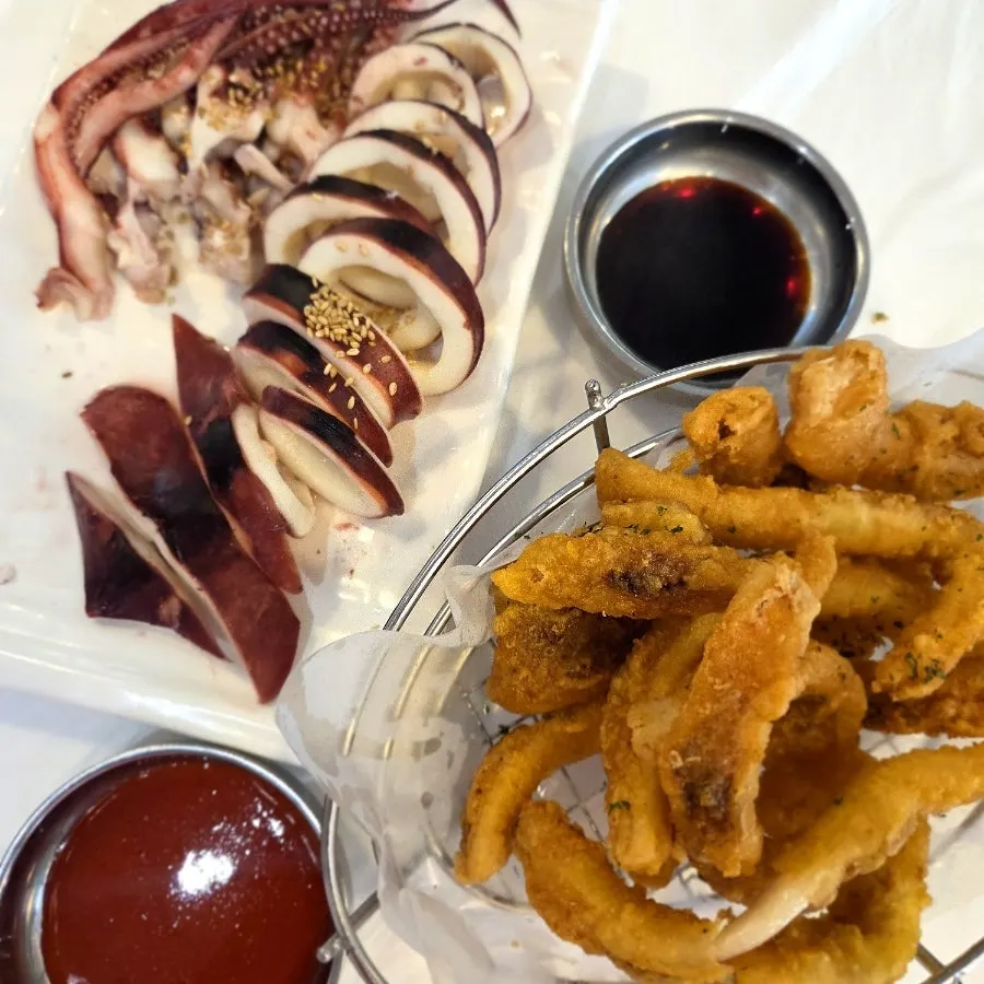 Full table spread of squid mulhoe at Ppwang Mulhoe