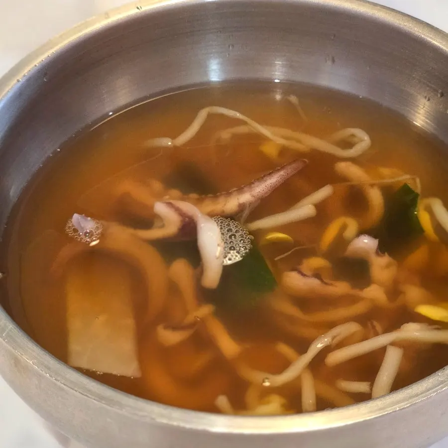 A bowl of spicy squid soup from the self-bar
