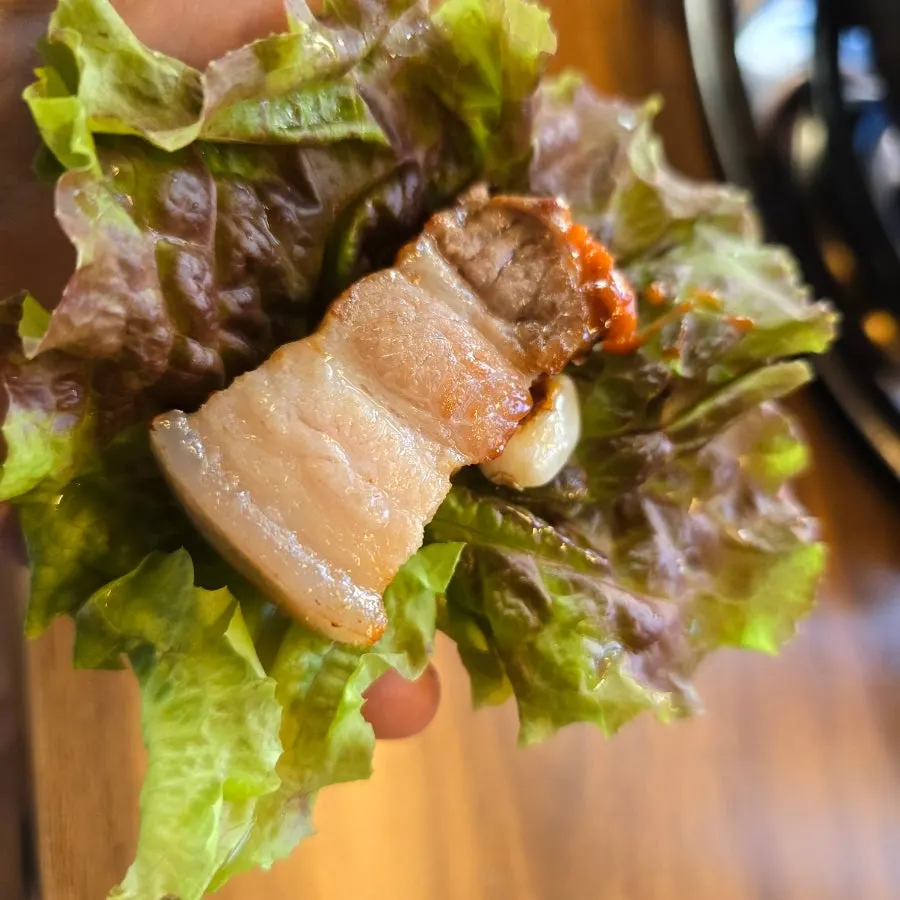 Ogyeopsal wrapped in lettuce