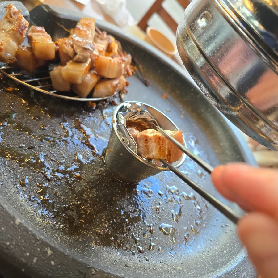 Salted anchovy sauce next to sweet sauce and bean flour combo