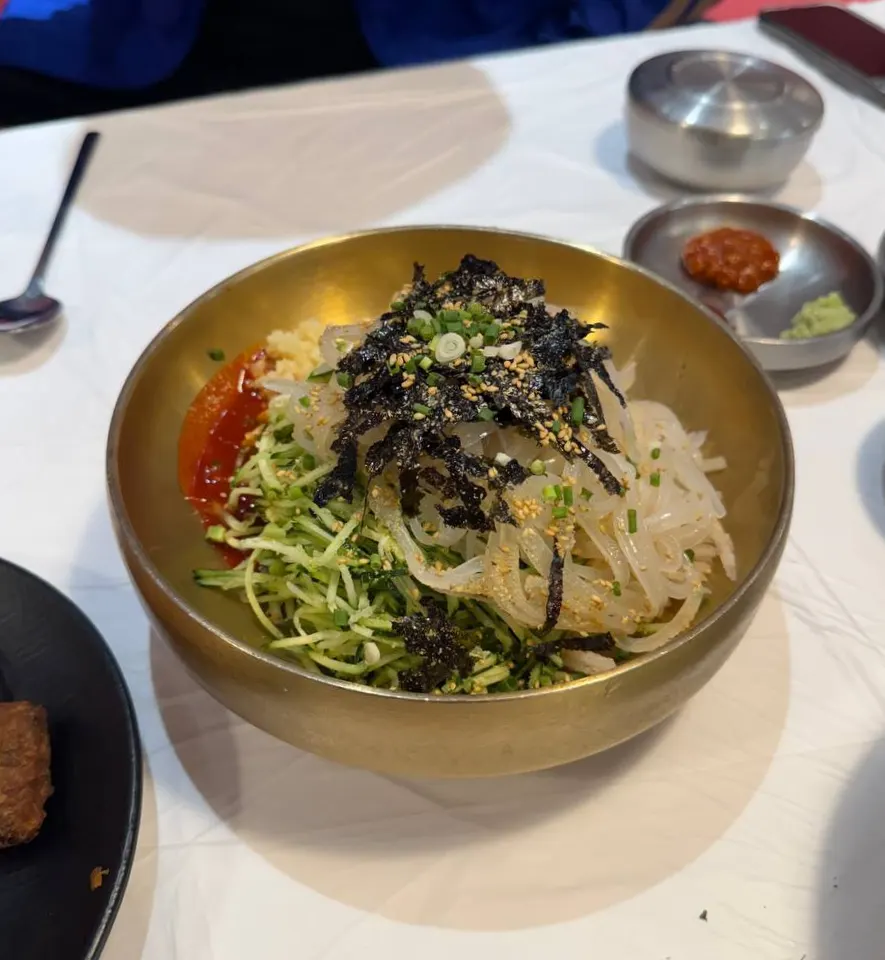 Hoe-deopbap and fried squid combination at Ppwang Mulhoe near Yeongildae Beach in Pohang