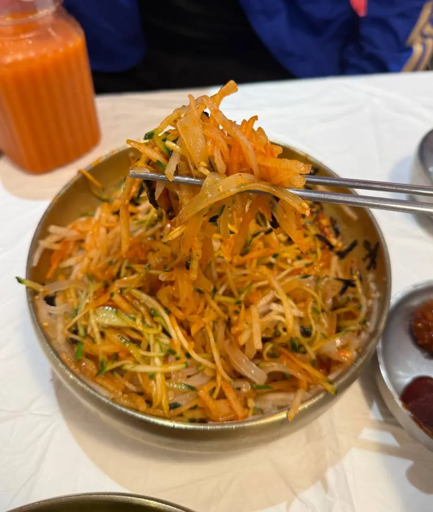 Squid mulhoe mixed with sauce and vegetables