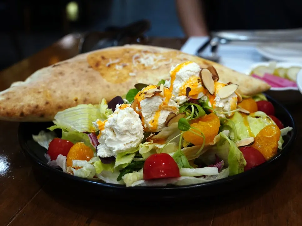 Ricotta cheese salad with cherry tomatoes and mandarin oranges