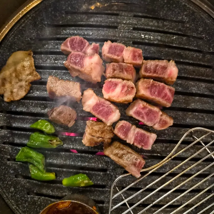 Iberico pork neck grilling