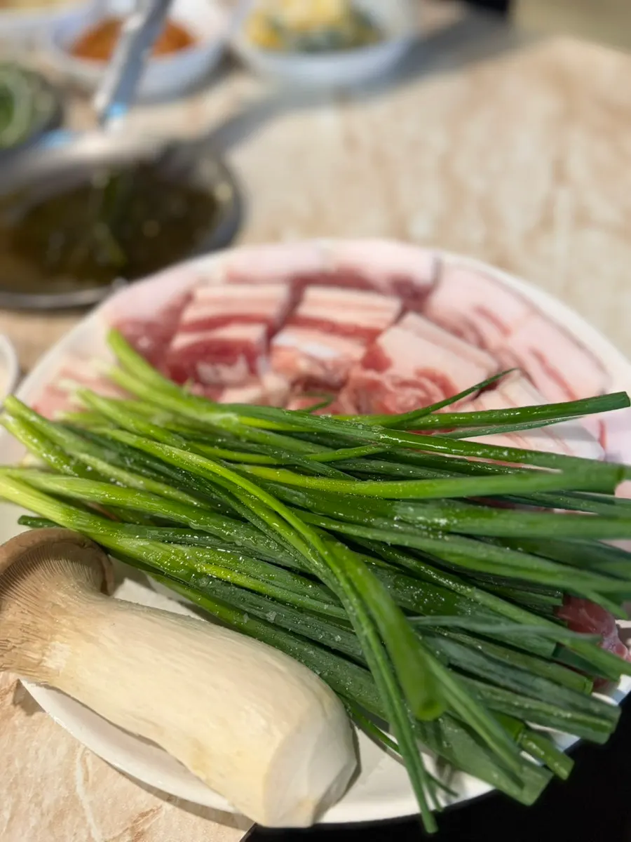 Close-up of side dishes and table setting