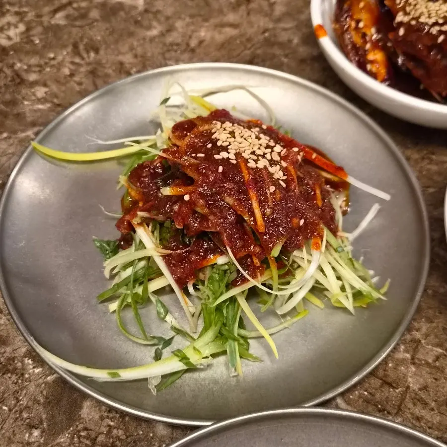 Side dishes and sauces on a plate at Pork80