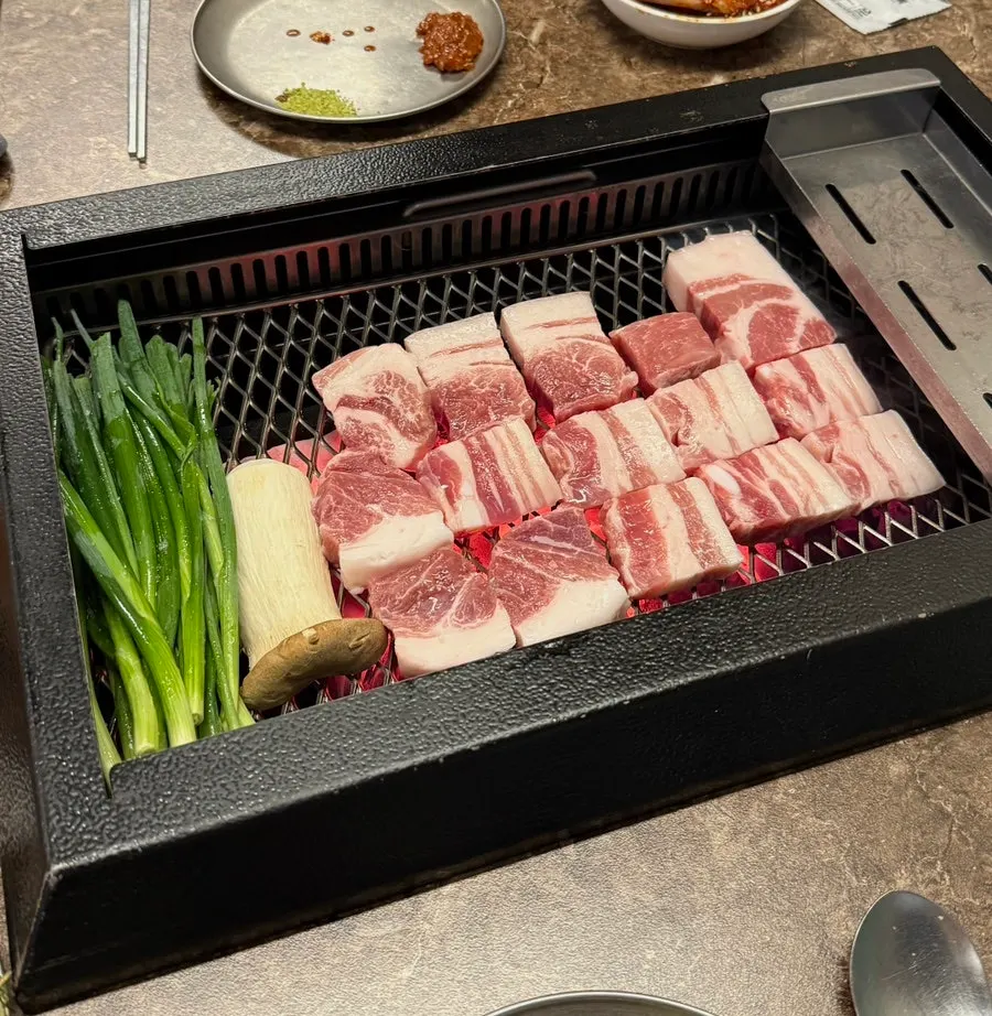 Nanchuk Matdon grilling over bincotan charcoal