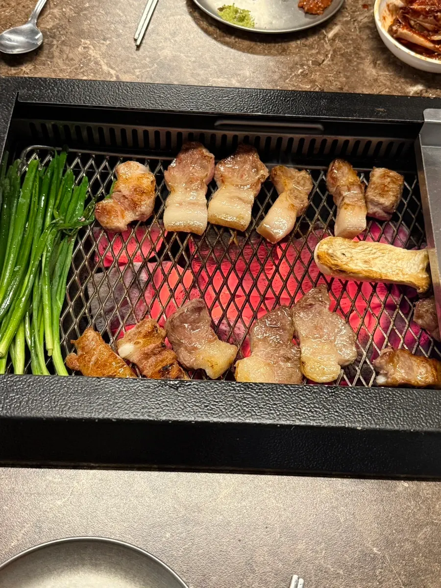 Cross-section of grilled black pork showing juices