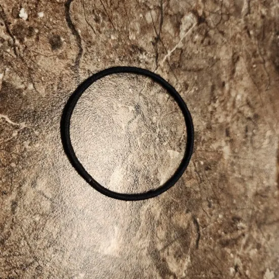 Apron and hair tie provided by staff