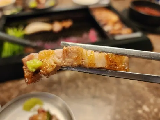 A piece of Nanchuk Matdon topped with wasabi
