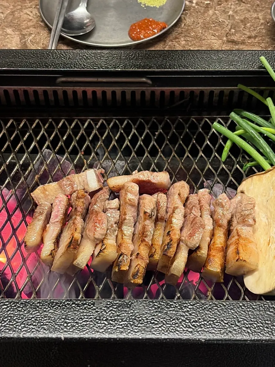 Staff grilling the first batch of nanchuk matdon