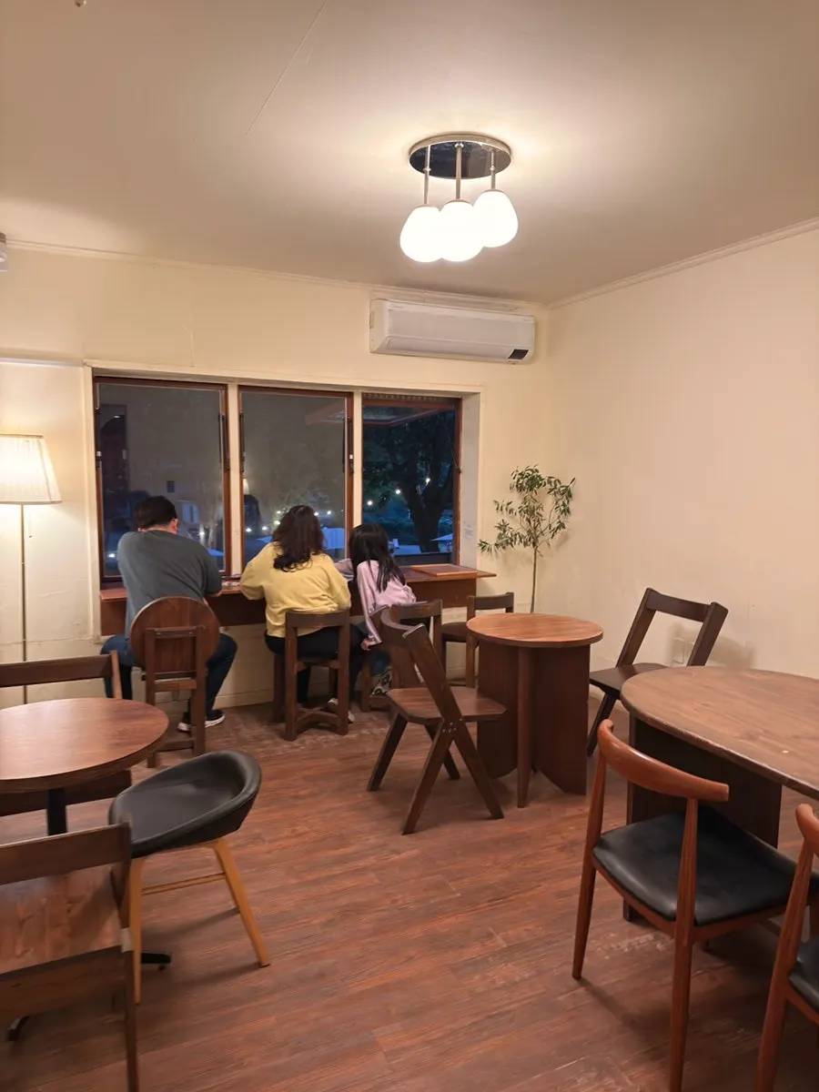 Café interior with wood-toned vintage furniture