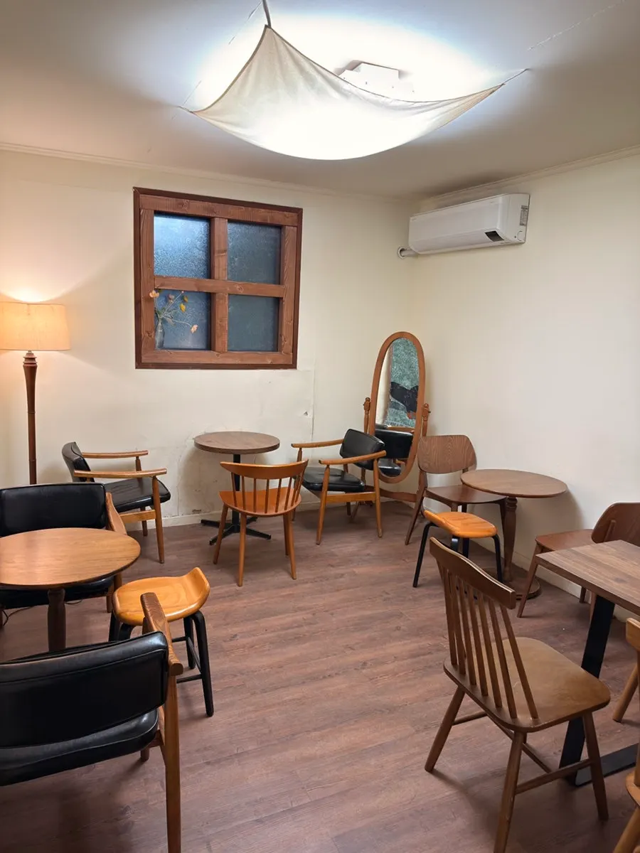 Room-style seating area that looks like a converted house
