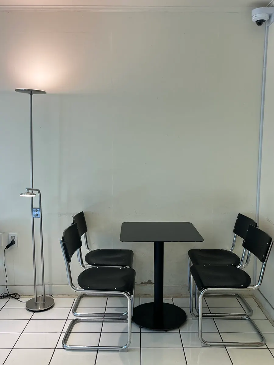 Forerest's menu board listing coffee and organic teas