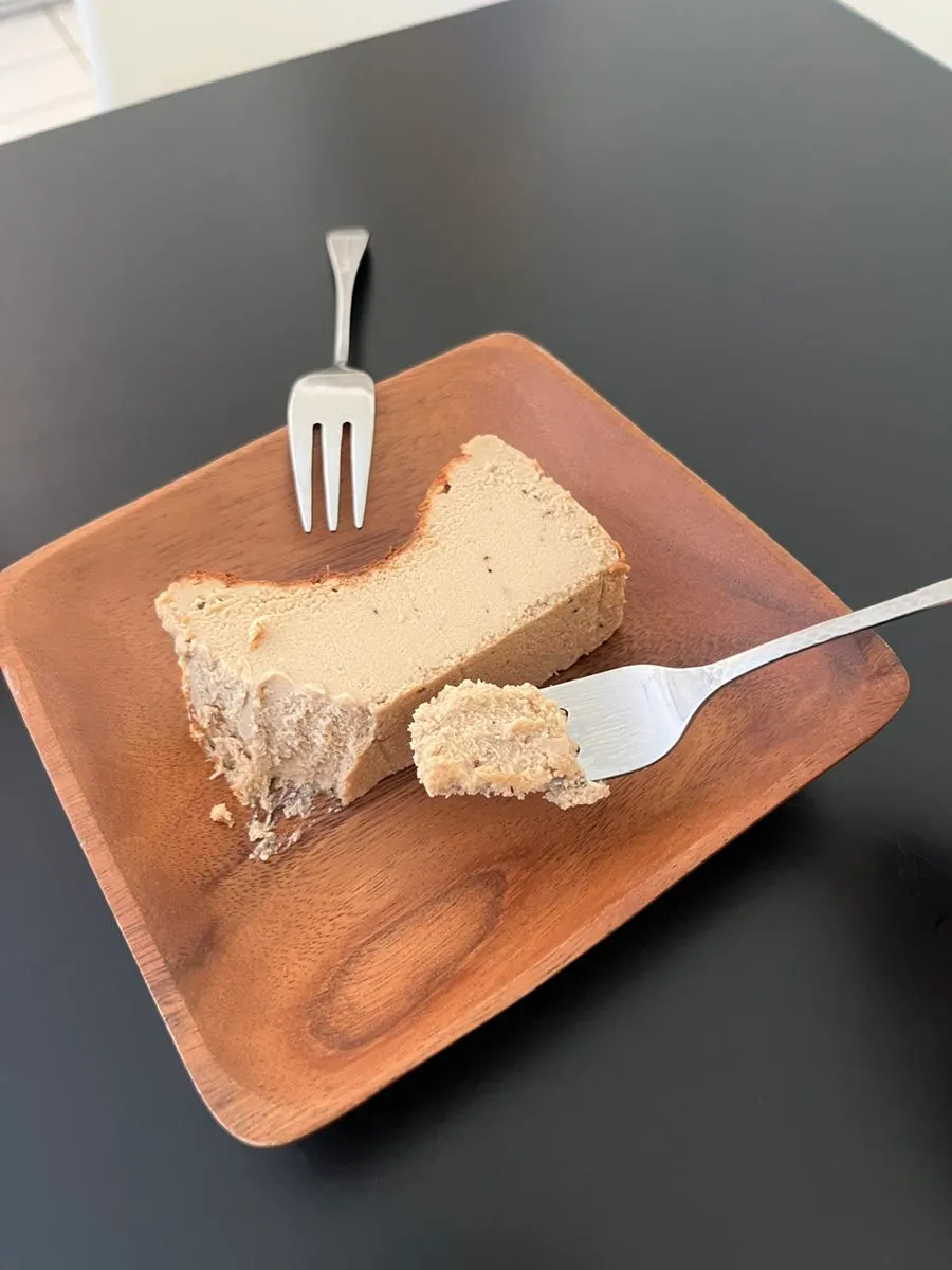 A dense slice of Earl Grey Basque cheesecake