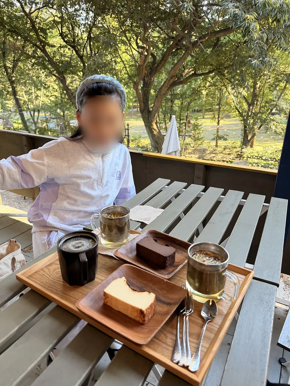 Decaf americano and Basque cheesecake on the window table