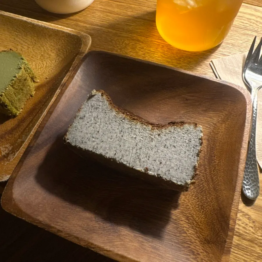 A slice of black sesame Basque cheesecake