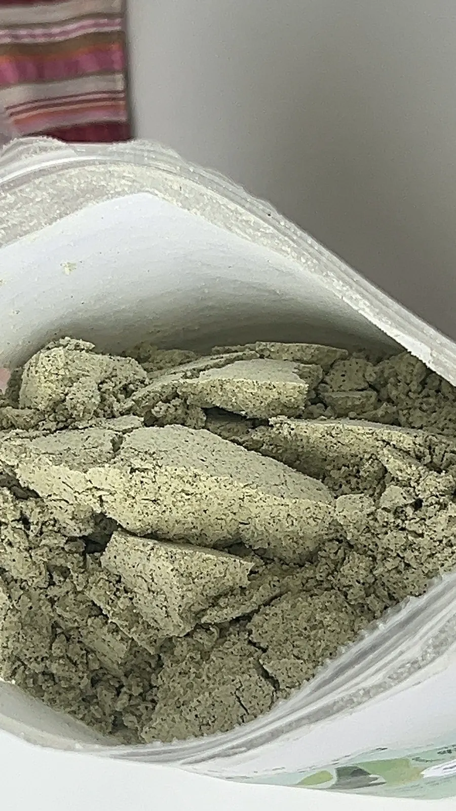 Two scoops of soy milk powder in a cup