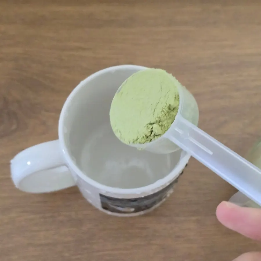 A scoop of matcha soy milk powder