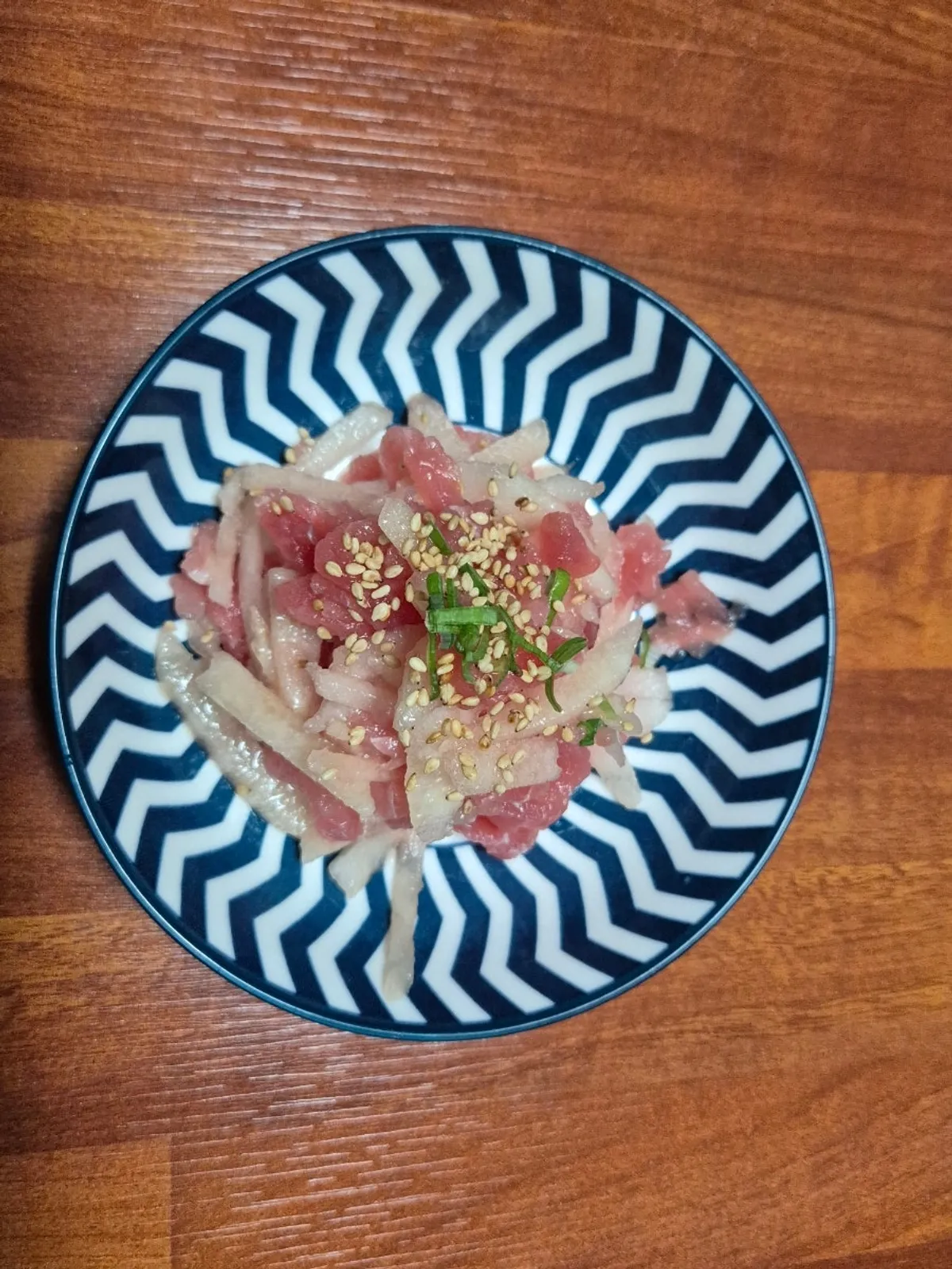 Raw minced tuna served before the course began