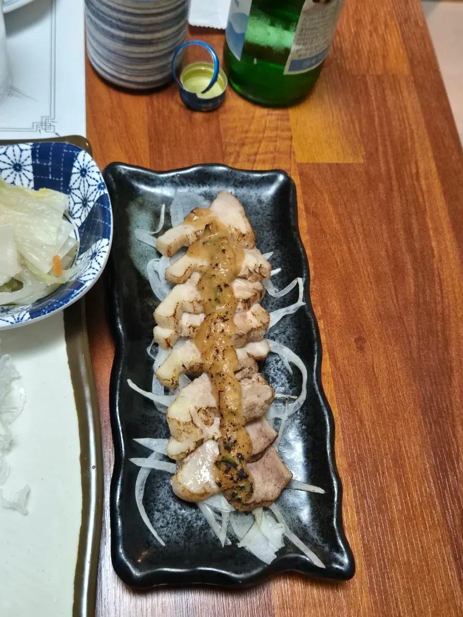 A plate of torch-seared chilled boiled pork
