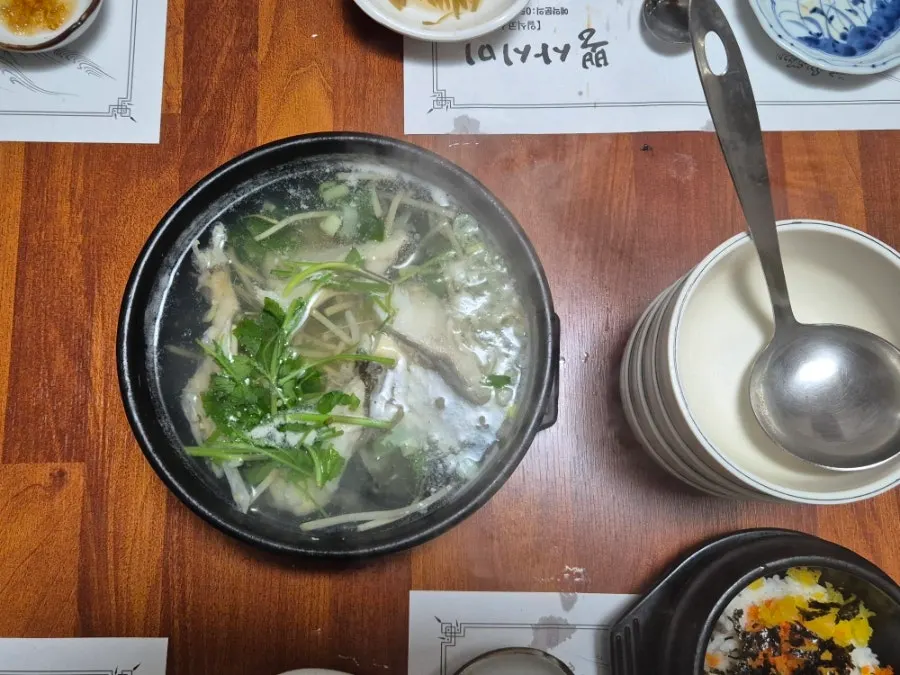 Pot of cod jiri soup for the final course