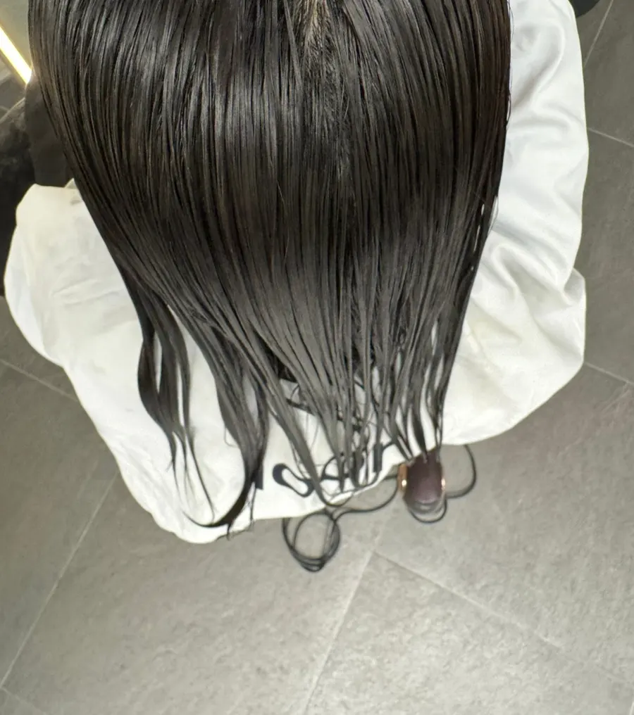 Checking hair condition during the treatment