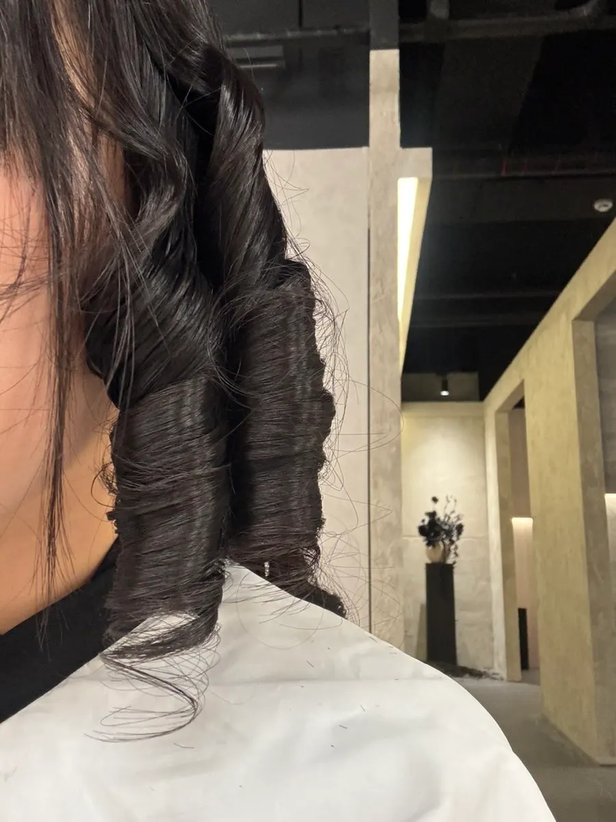 Shape of the natural thick wave curls