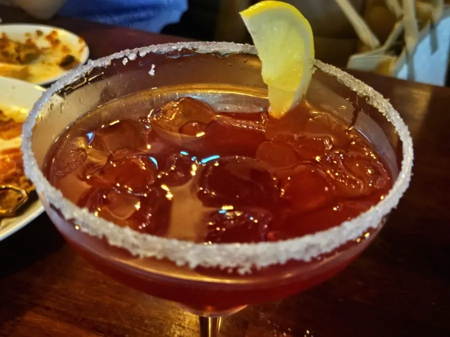 Red Margarita cocktail with a rimmed glass