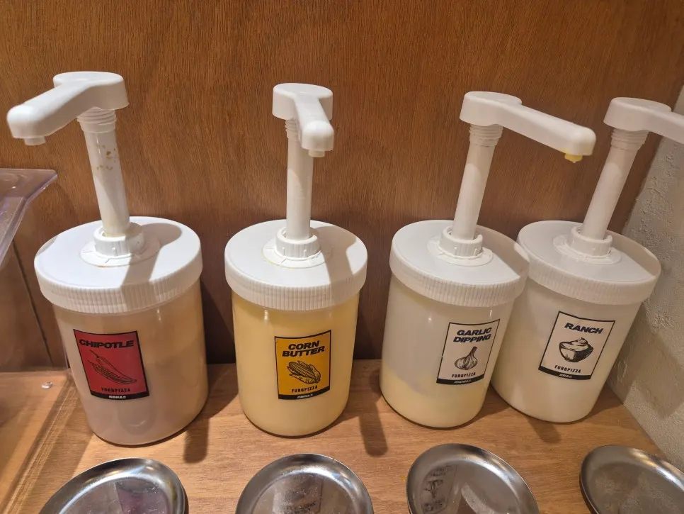 Free sauce corner with ranch, chipotle, mayo, and garlic dipping sauces