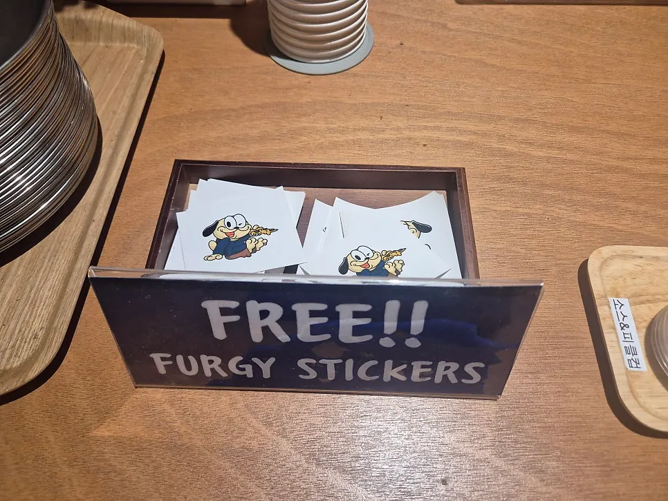 Dog stickers displayed at the self-serve bar