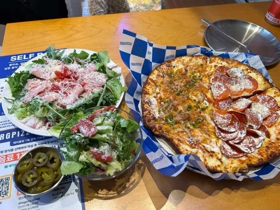Plate of pizza mid-meal