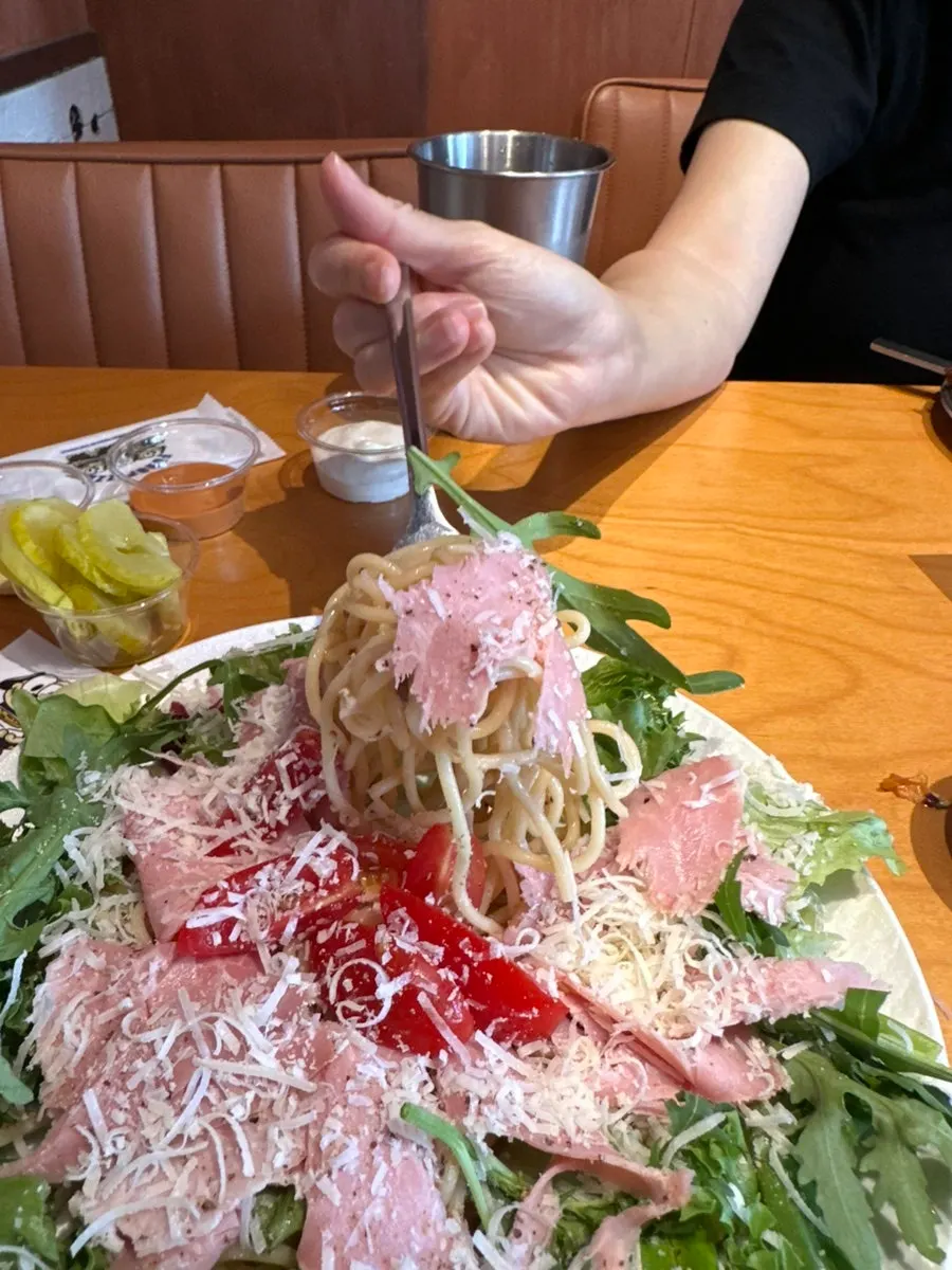 Salad ordered alongside the pizza