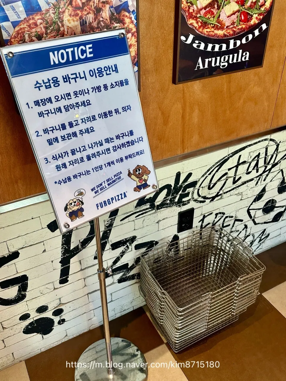 Storage baskets at the entrance of Pug Pizza House Sillim Branch