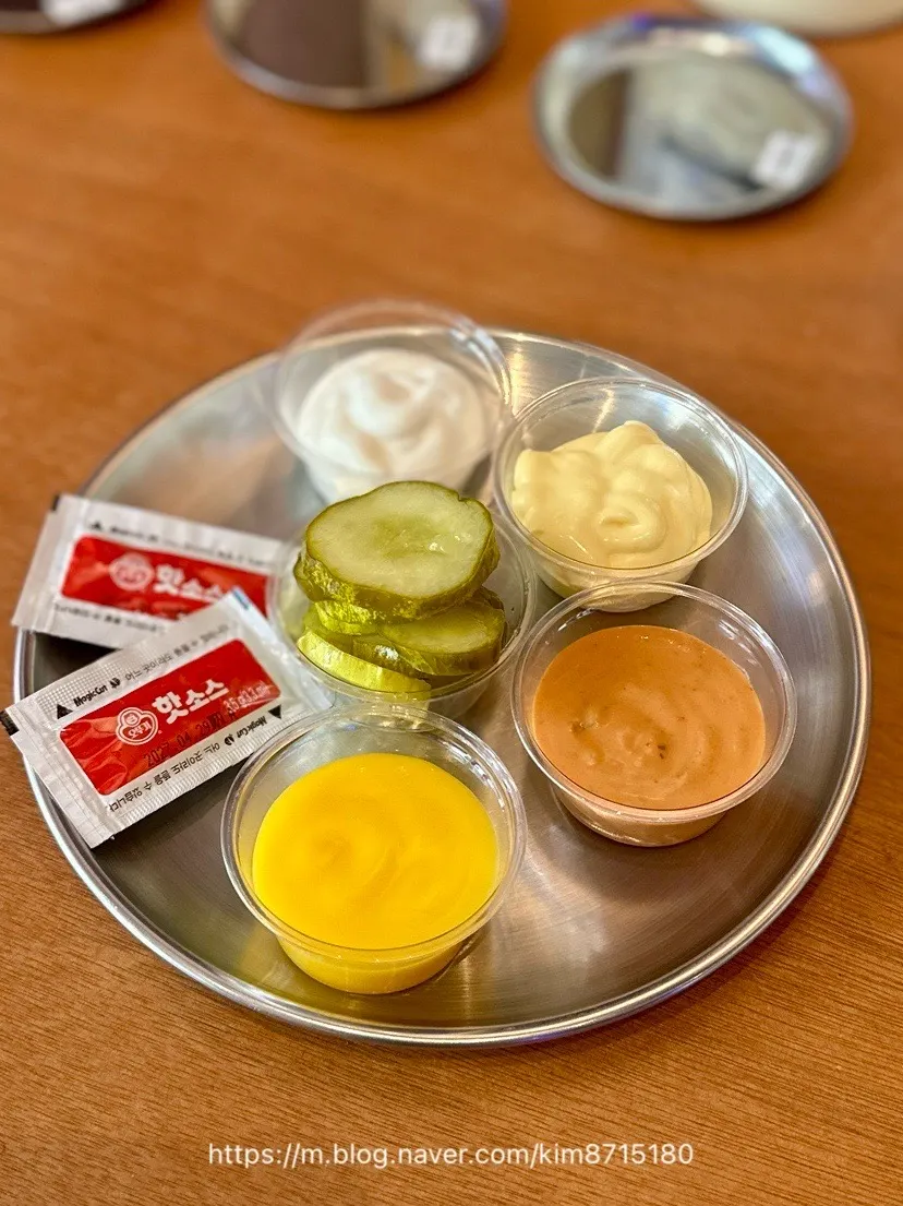 Pickles, hot sauce, and ice station at the self bar