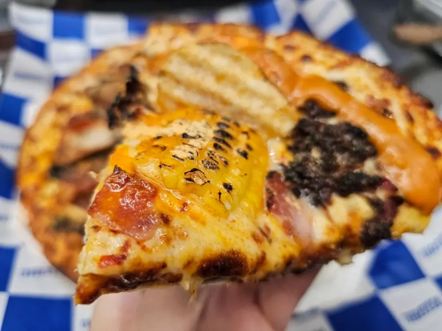 Amazing Shrimp pizza topped with whole corn kernels, bulgogi, and shrimp