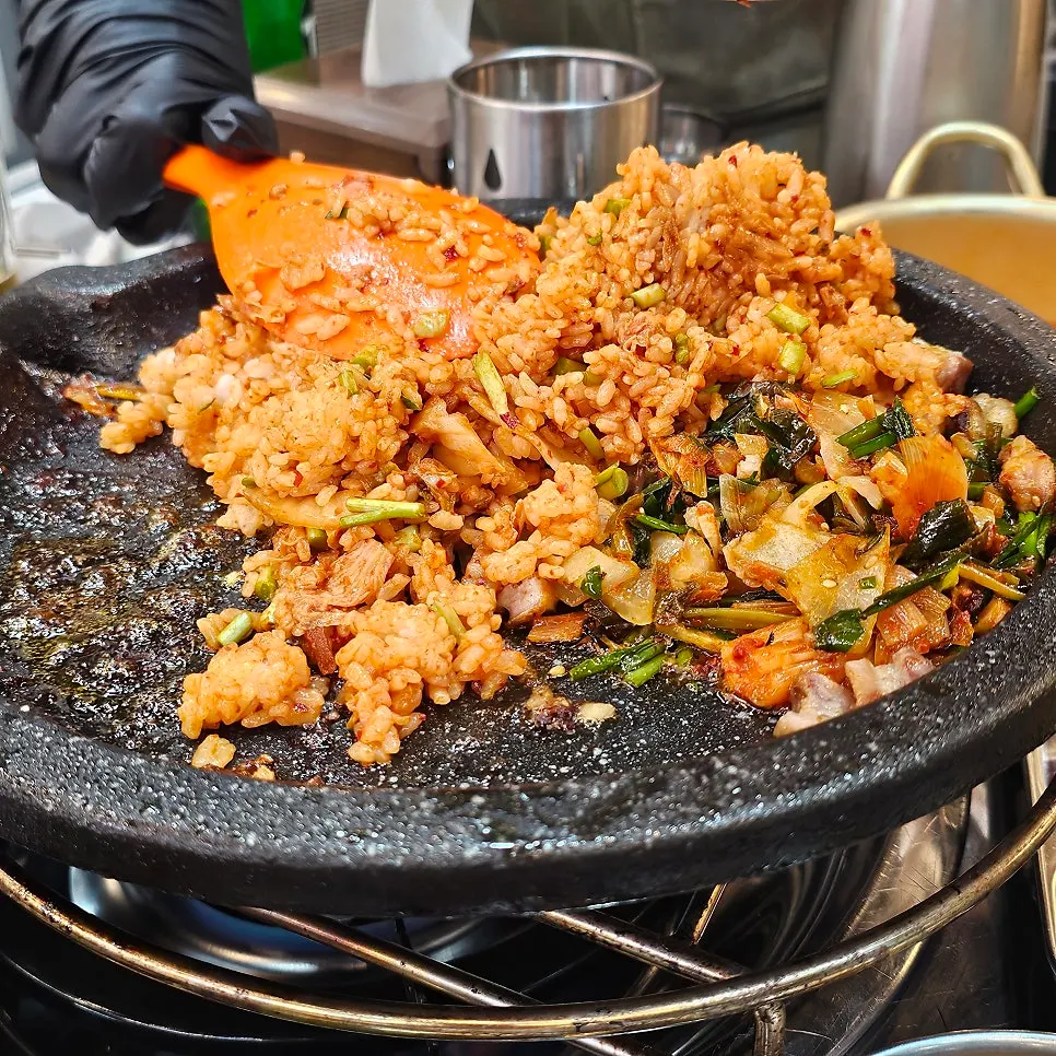 Fried rice being cooked on the griddle