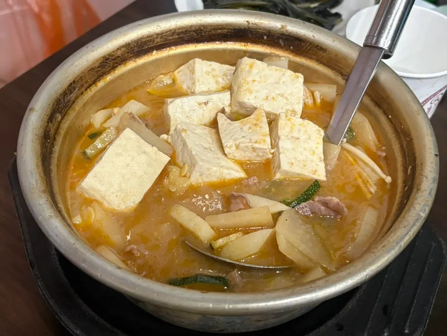 Doenjang jjigae with tofu and enoki mushrooms