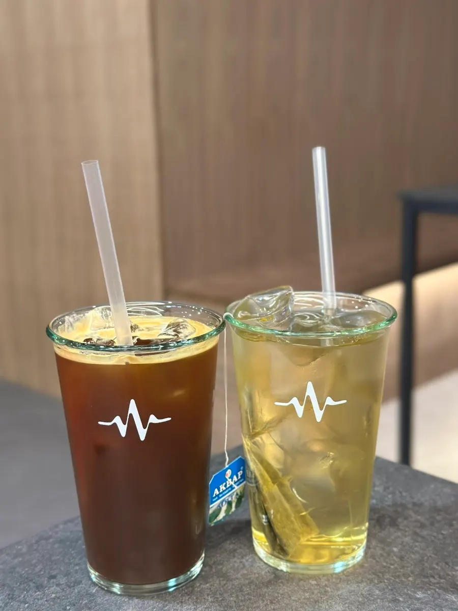 Two cups of iced peppermint tea and americano