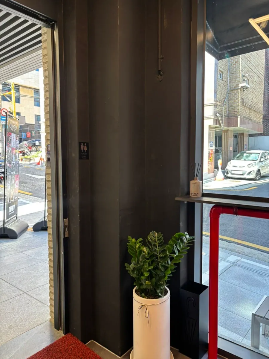 Exterior view of the café on the first floor of the alley