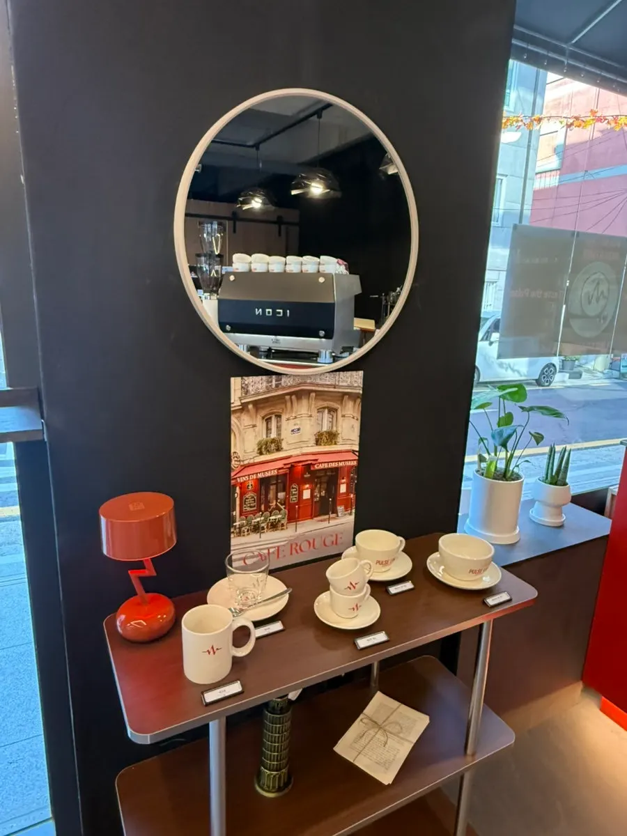 Vertical shot of the café's bold accent-color interior