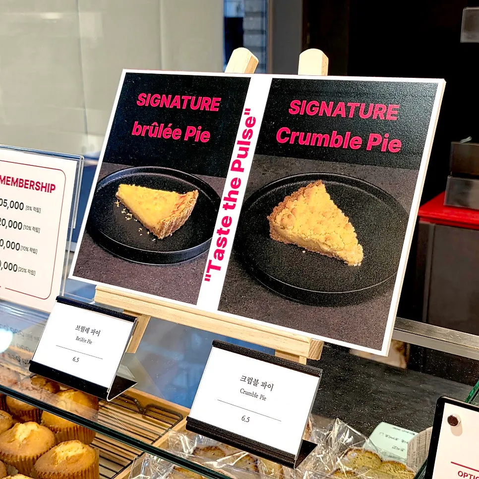 Signature handmade brûlée pie and crumble pie on display