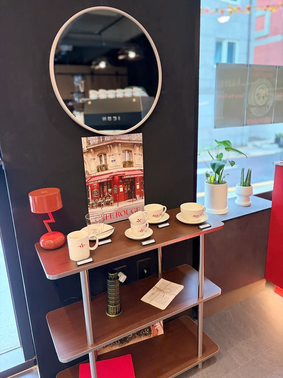 Bakery display case with pound cakes and pies