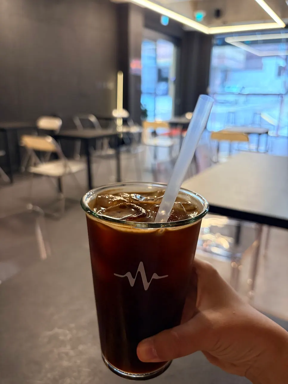 Two cups — Vienna coffee and iced Americano
