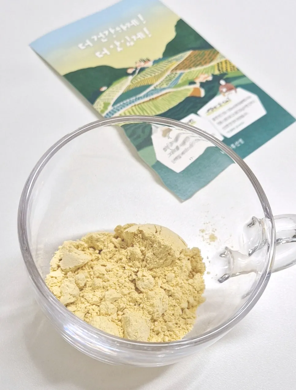 Preparing powder and warm water in a cup
