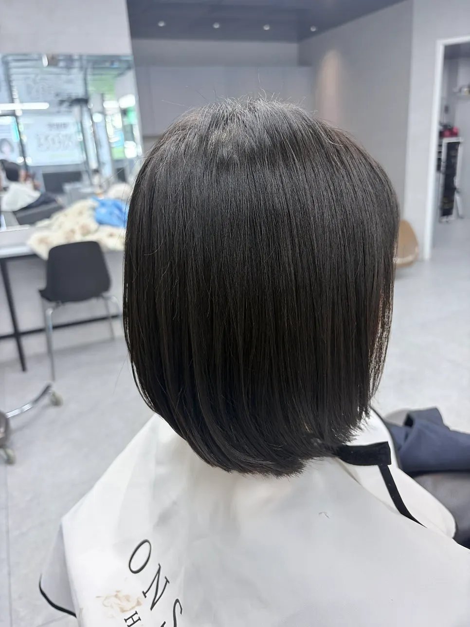 Neat, smooth hair result after the straightening treatment