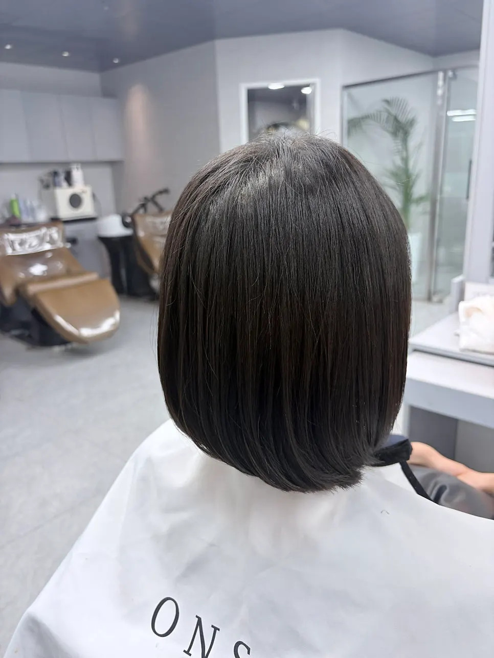 Side view of the finished straightened hairstyle
