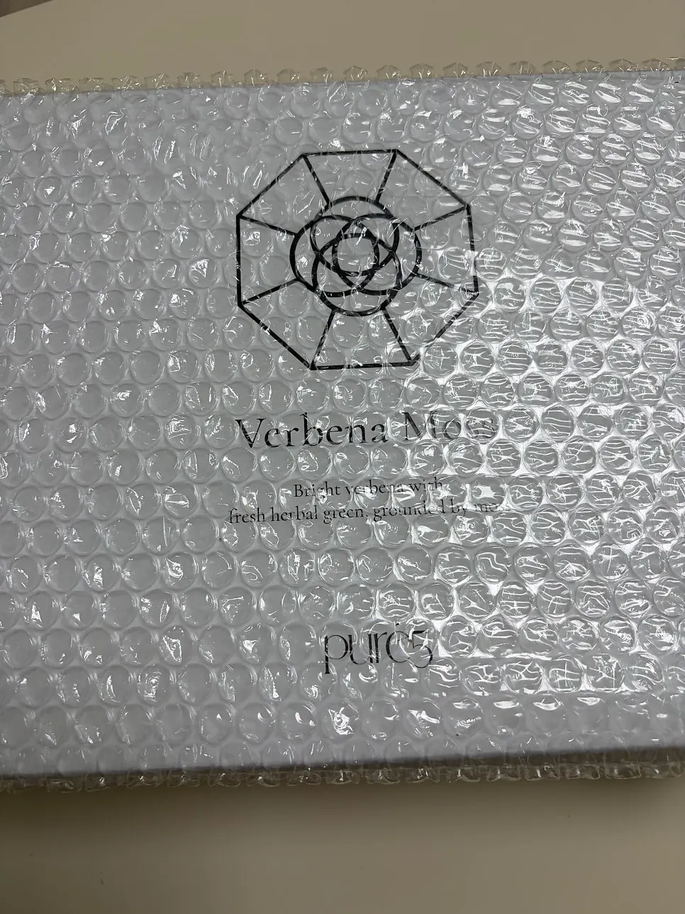 Diffuser in a clear glass bottle
